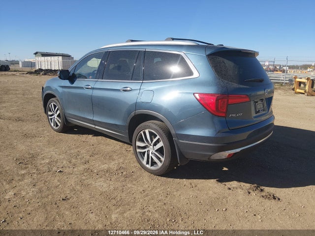 Продажа на аукционе авто 2017 Honda Pilot Touring, vin: 5FNYF6H92HB505784, номер лота: 12710466