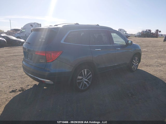 Продажа на аукционе авто 2017 Honda Pilot Touring, vin: 5FNYF6H92HB505784, номер лота: 12710466