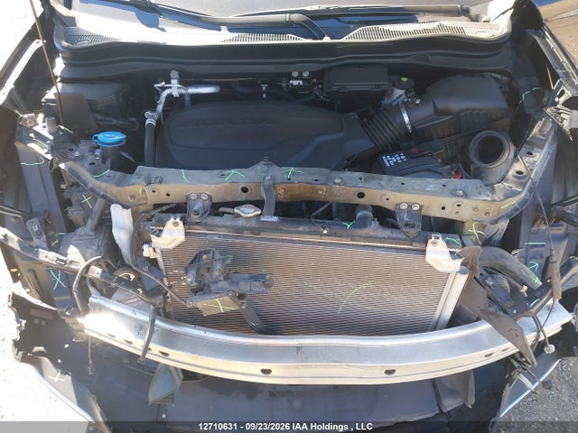 12710631 :رقم المزاد ، 5FNYF6H90MB501033 vin ، 2021 Honda Pilot Touring 8p مزاد بيع