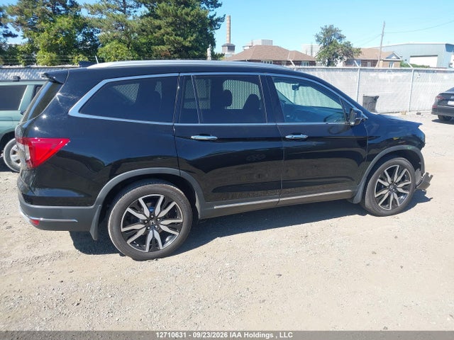 12710631 :رقم المزاد ، 5FNYF6H90MB501033 vin ، 2021 Honda Pilot Touring 8p مزاد بيع