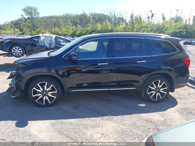 12710631 :رقم المزاد ، 5FNYF6H90MB501033 vin ، 2021 Honda Pilot Touring 8p مزاد بيع