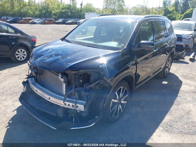 12710631 :رقم المزاد ، 5FNYF6H90MB501033 vin ، 2021 Honda Pilot Touring 8p مزاد بيع
