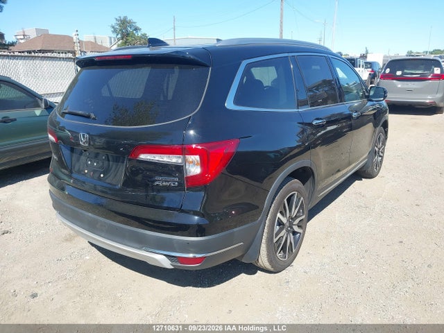 12710631 :رقم المزاد ، 5FNYF6H90MB501033 vin ، 2021 Honda Pilot Touring 8p مزاد بيع