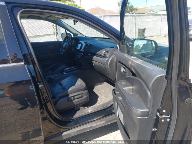 12710631 :رقم المزاد ، 5FNYF6H90MB501033 vin ، 2021 Honda Pilot Touring 8p مزاد بيع
