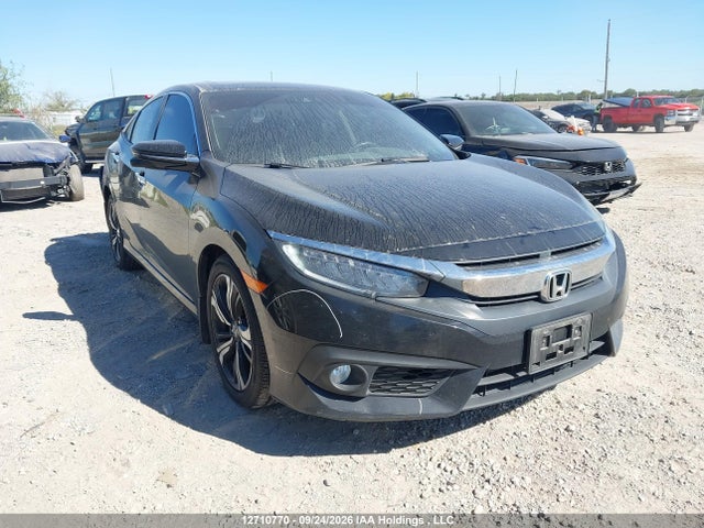 Auction sale of the 2017 Honda Civic Touring, vin: 2HGFC1F9XHH100855, lot number: 12710770