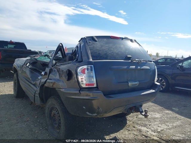 12711421 :رقم المزاد ، 1J4GW58N3YC305278 vin ، 2000 Jeep Grand Cherokee Limited مزاد بيع