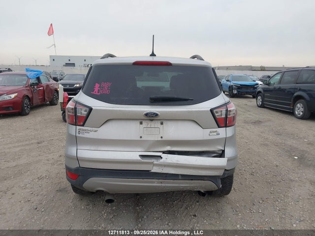 12711813 :رقم المزاد ، 1FMCU9HD6JUA12883 vin ، 2018 Ford Escape Sel مزاد بيع