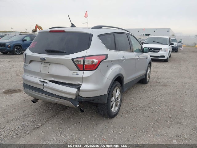 12711813 :رقم المزاد ، 1FMCU9HD6JUA12883 vin ، 2018 Ford Escape Sel مزاد بيع