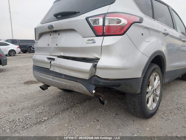 12711813 :رقم المزاد ، 1FMCU9HD6JUA12883 vin ، 2018 Ford Escape Sel مزاد بيع