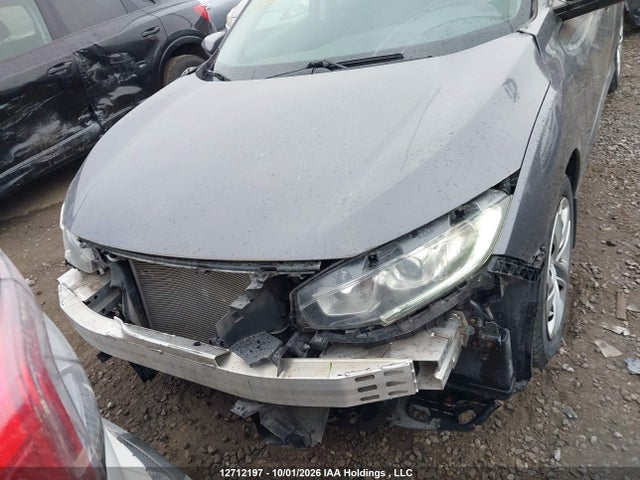 2HGFC2F57HH025566 Honda Civic Lx