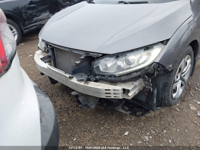 2HGFC2F57HH025566 Honda Civic Lx