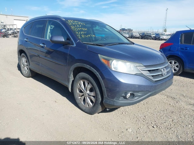 Auction sale of the 2014 Honda Cr-v Touring, vin: 2HKRM4H90EH119831, lot number: 12712472