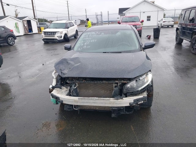 Auction sale of the 2019 Honda Civic Ex, vin: 2HGFC2F71KH009694, lot number: 12712692