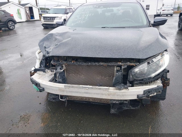 Auction sale of the 2019 Honda Civic Ex, vin: 2HGFC2F71KH009694, lot number: 12712692