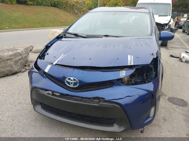 12713450 :رقم المزاد ، JTDZN3EU4GJ045498 vin ، 2016 Toyota Prius V مزاد بيع