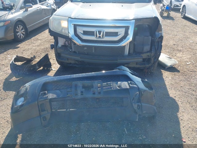 12714633 :رقم المزاد ، 5FNYF4H97BB505792 vin ، 2011 Honda Pilot Touring مزاد بيع