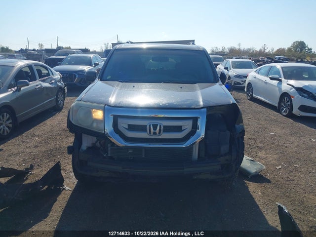 12714633 :رقم المزاد ، 5FNYF4H97BB505792 vin ، 2011 Honda Pilot Touring مزاد بيع