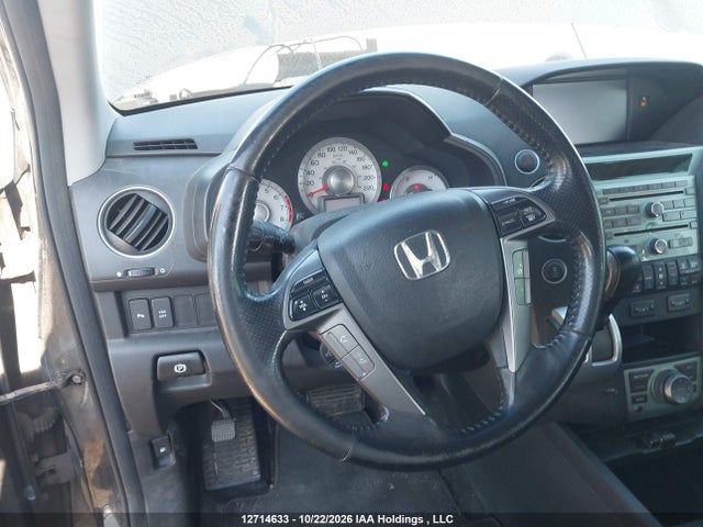 12714633 :رقم المزاد ، 5FNYF4H97BB505792 vin ، 2011 Honda Pilot Touring مزاد بيع