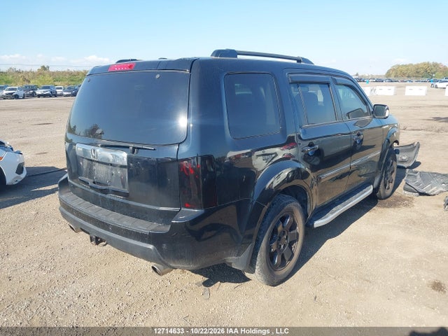 12714633 :رقم المزاد ، 5FNYF4H97BB505792 vin ، 2011 Honda Pilot Touring مزاد بيع