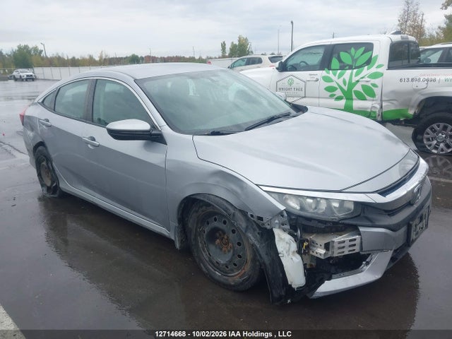 Auction sale of the 2018 Honda Civic Lx, vin: 2HGFC2F51JH019462, lot number: 12714668