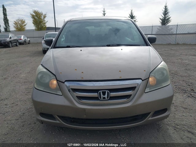 12715951 :رقم المزاد ، 5FNRL38257B501788 vin ، 2007 Honda Odyssey Lx مزاد بيع