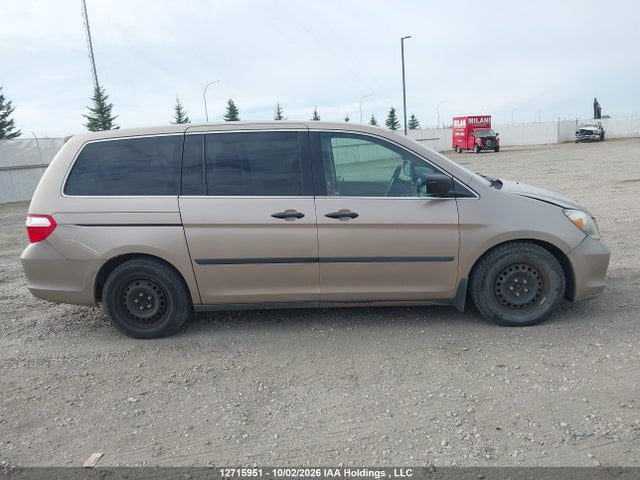 12715951 :رقم المزاد ، 5FNRL38257B501788 vin ، 2007 Honda Odyssey Lx مزاد بيع