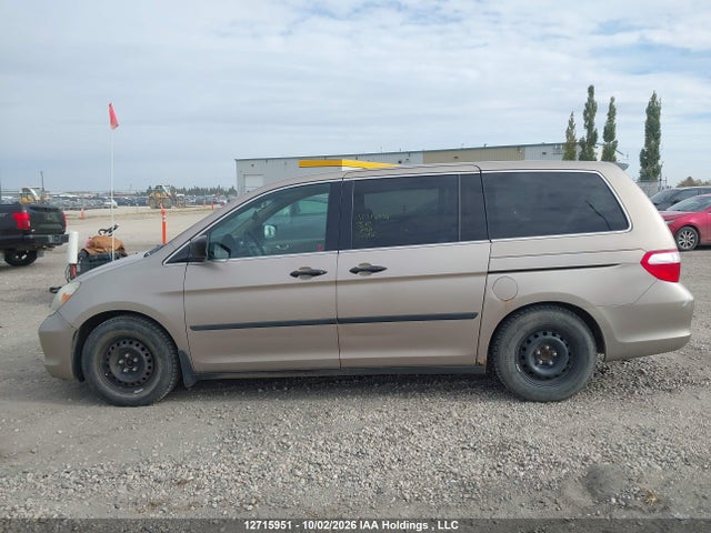 12715951 :رقم المزاد ، 5FNRL38257B501788 vin ، 2007 Honda Odyssey Lx مزاد بيع