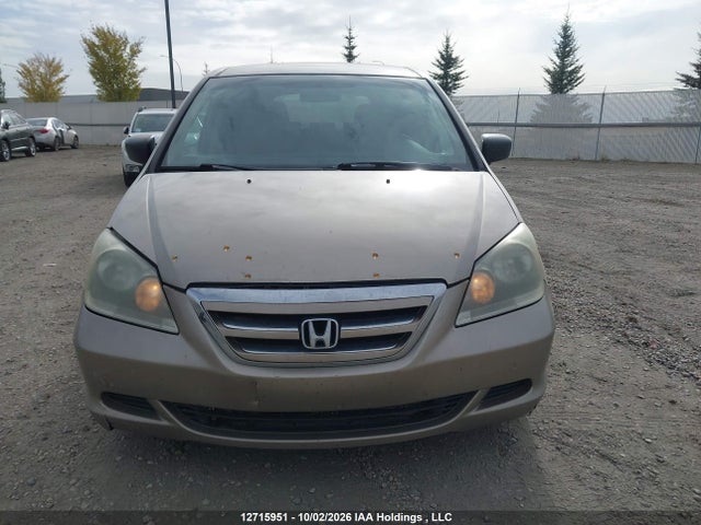12715951 :رقم المزاد ، 5FNRL38257B501788 vin ، 2007 Honda Odyssey Lx مزاد بيع