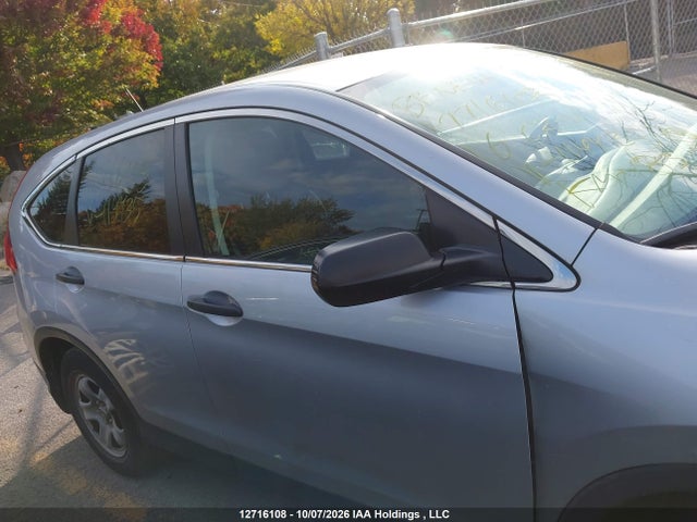 2HKRM4H32GH114435 Honda CR-V LX