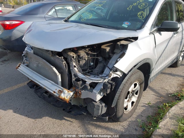 2HKRM4H32GH114435 Honda CR-V LX