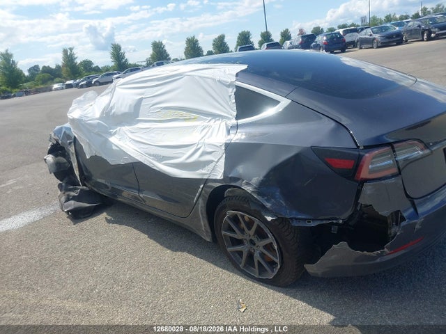 2020 Tesla Model 3 Standard Range Plus მანქანა იყიდება აუქციონზე, vin: 5YJ3E1EA9LF529796, აუქციონის ნომერი: 12680028