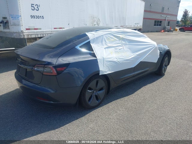 2020 Tesla Model 3 Standard Range Plus მანქანა იყიდება აუქციონზე, vin: 5YJ3E1EA9LF529796, აუქციონის ნომერი: 12680028