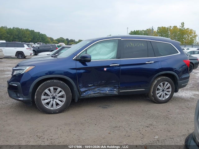 12717506 :رقم المزاد ، 5FNYF6H91KB501569 vin ، 2019 Honda Pilot Touring مزاد بيع