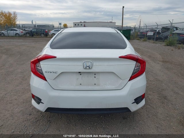 2HGFC2F59JH034372 Honda Civic Lx