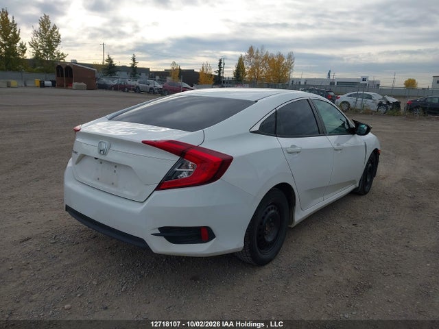 2HGFC2F59JH034372 Honda Civic Lx