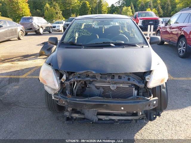 12702670 :رقم المزاد ، JTDBT923271126909 vin ، 2007 Toyota Yaris مزاد بيع