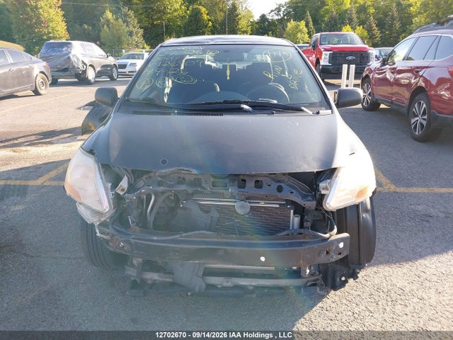 12702670 :رقم المزاد ، JTDBT923271126909 vin ، 2007 Toyota Yaris مزاد بيع