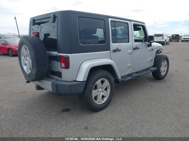 12720144 :رقم المزاد ، 1J4BA5H11AL215218 vin ، 2010 Jeep Wrangler Unlimited Sahara مزاد بيع