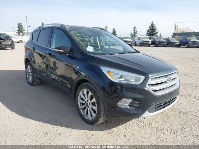 Продажа на аукционе авто 2017 Ford Escape Titanium, vin: 1FMCU9J94HUD61105, номер лота: 12721333