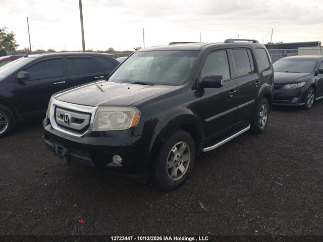 2011 Honda Pilot Touring მანქანა იყიდება აუქციონზე, vin: 5FNYF4H95BB504544, აუქციონის ნომერი: 12723447