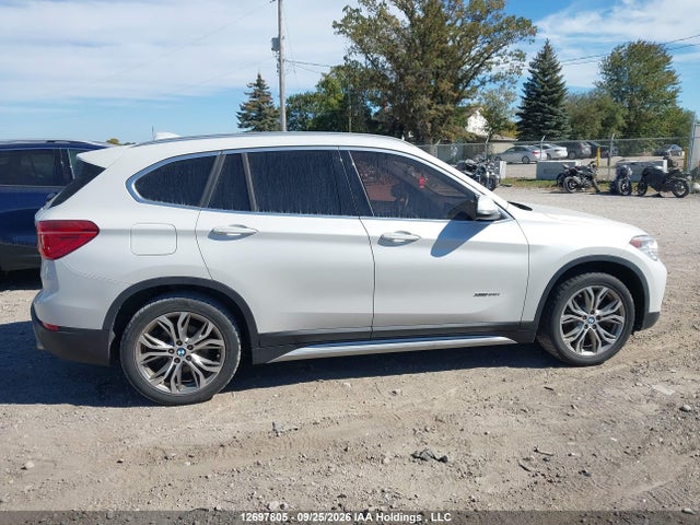 12697805 :رقم المزاد ، WBXHT3C34GP881906 vin ، 2016 Bmw X1 Xdrive28i مزاد بيع
