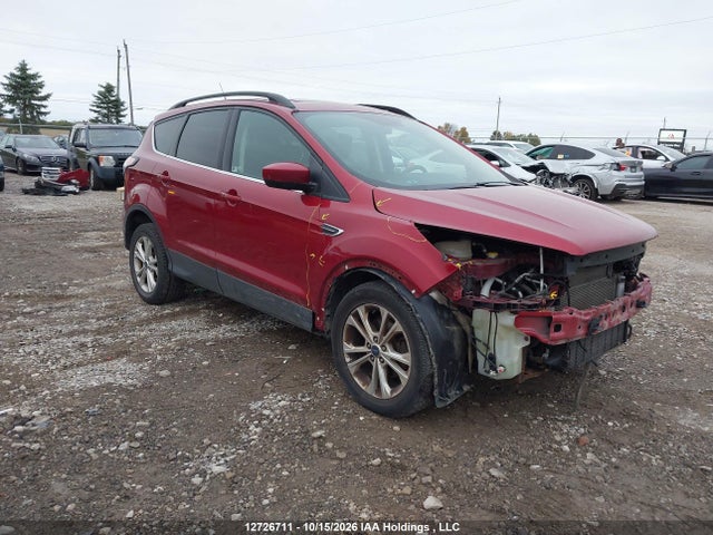 12726711 :رقم المزاد ، 1FMCU0HD8JUD52967 vin ، 2018 Ford Escape Sel مزاد بيع