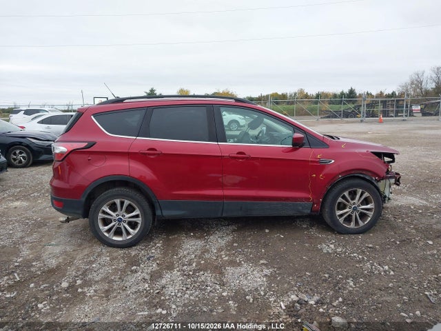 12726711 :رقم المزاد ، 1FMCU0HD8JUD52967 vin ، 2018 Ford Escape Sel مزاد بيع