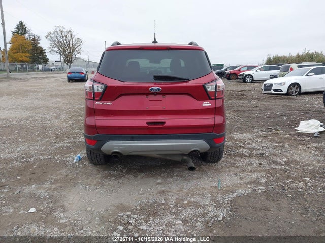 12726711 :رقم المزاد ، 1FMCU0HD8JUD52967 vin ، 2018 Ford Escape Sel مزاد بيع