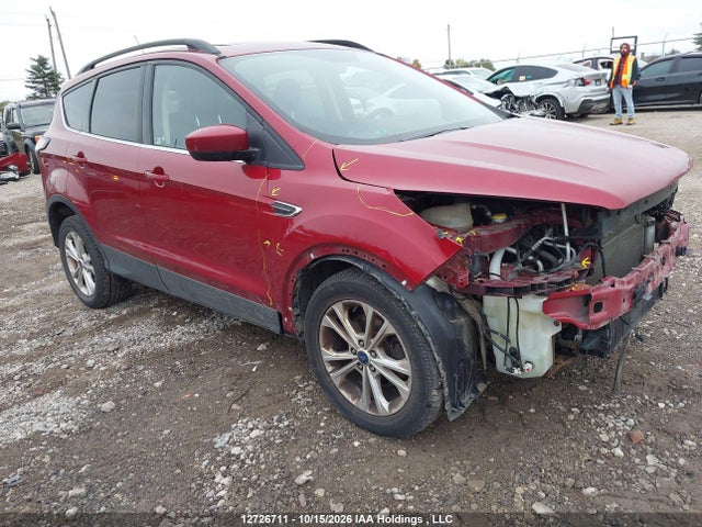 12726711 :رقم المزاد ، 1FMCU0HD8JUD52967 vin ، 2018 Ford Escape Sel مزاد بيع