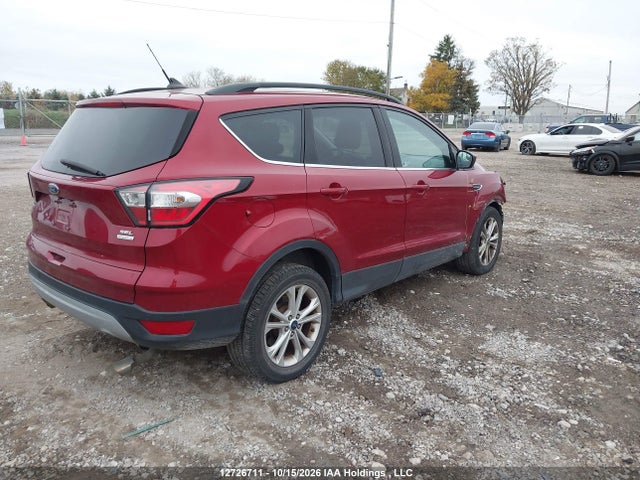 12726711 :رقم المزاد ، 1FMCU0HD8JUD52967 vin ، 2018 Ford Escape Sel مزاد بيع