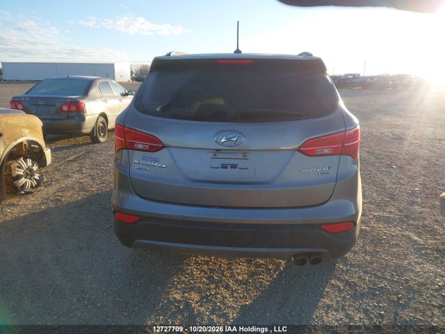12727709 :رقم المزاد ، 5XYZUDLA2FG241682 vin ، 2015 Hyundai Santa Fe Sport مزاد بيع