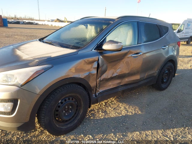 12727709 :رقم المزاد ، 5XYZUDLA2FG241682 vin ، 2015 Hyundai Santa Fe Sport مزاد بيع