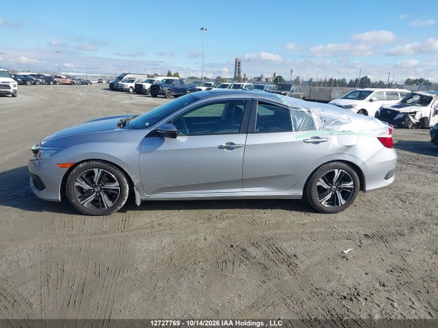 Продаж на аукціоні авто 2017 Honda Civic Touring, vin: 2HGFC1F99HH109482, номер лоту: 12727769