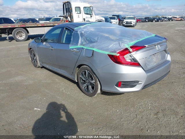 Продаж на аукціоні авто 2017 Honda Civic Touring, vin: 2HGFC1F99HH109482, номер лоту: 12727769